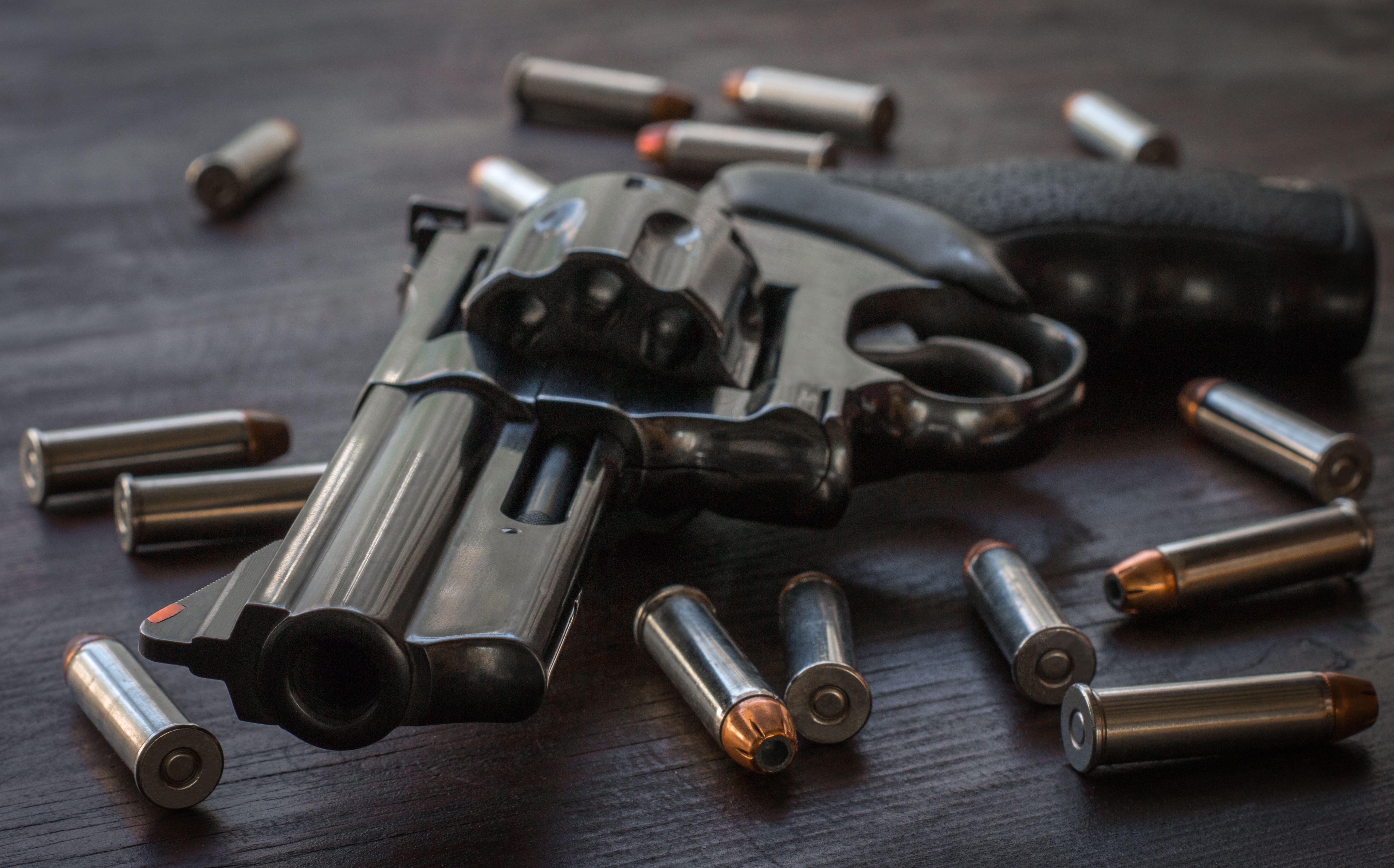 357 mag laying on table with ammo spread out