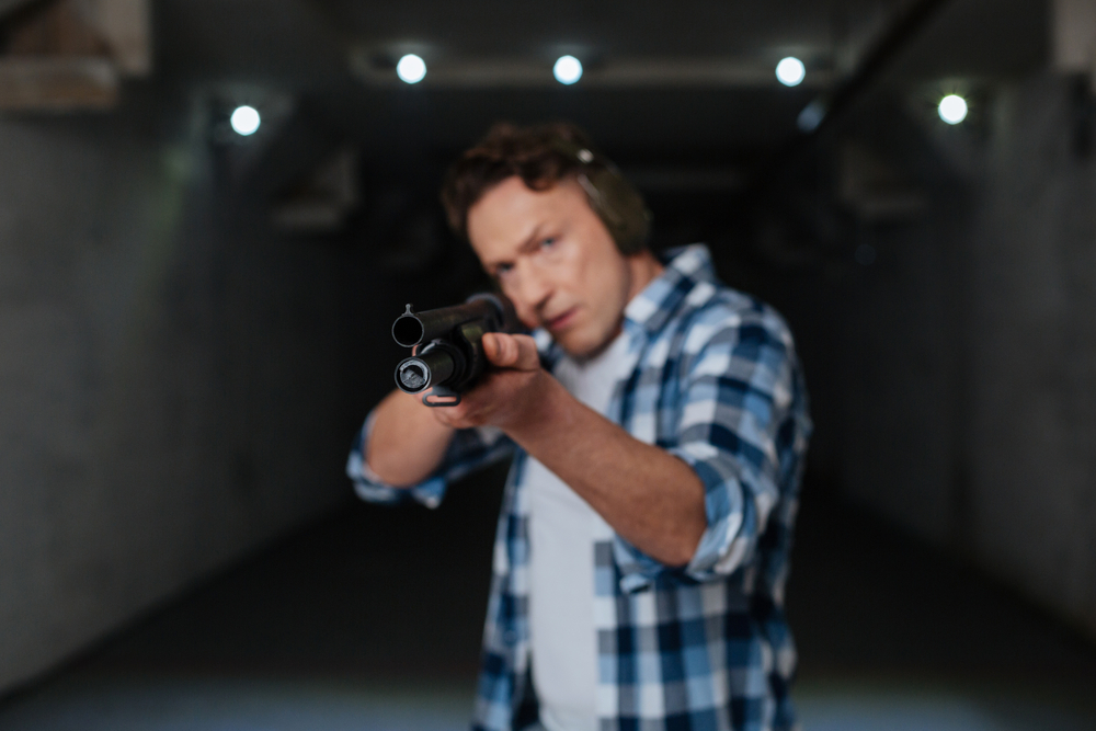 Man training with shotgun