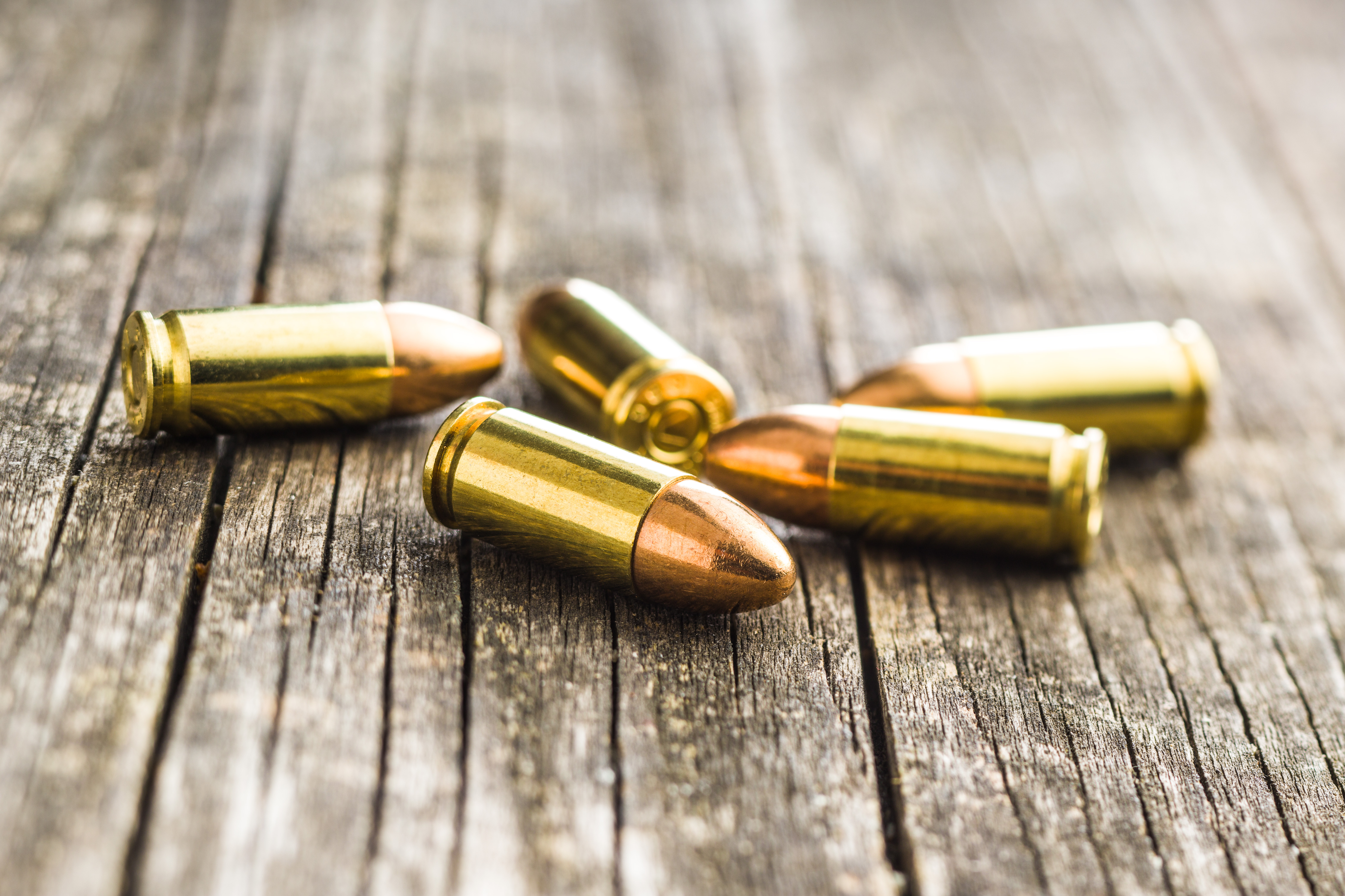 9mm ammo spread out on a table