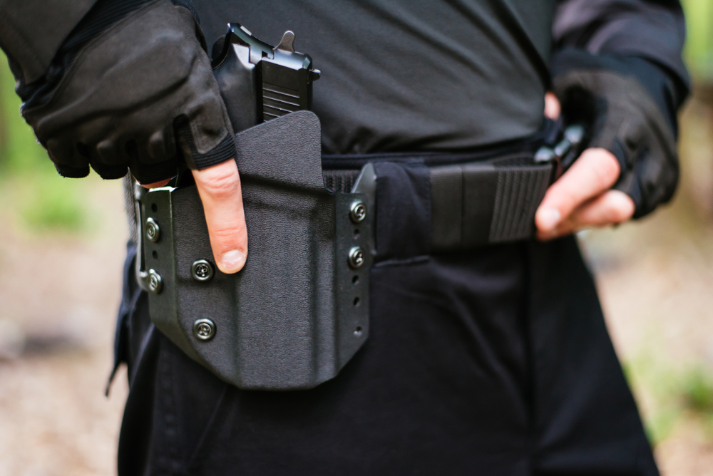 Individual carrying OWB strong side