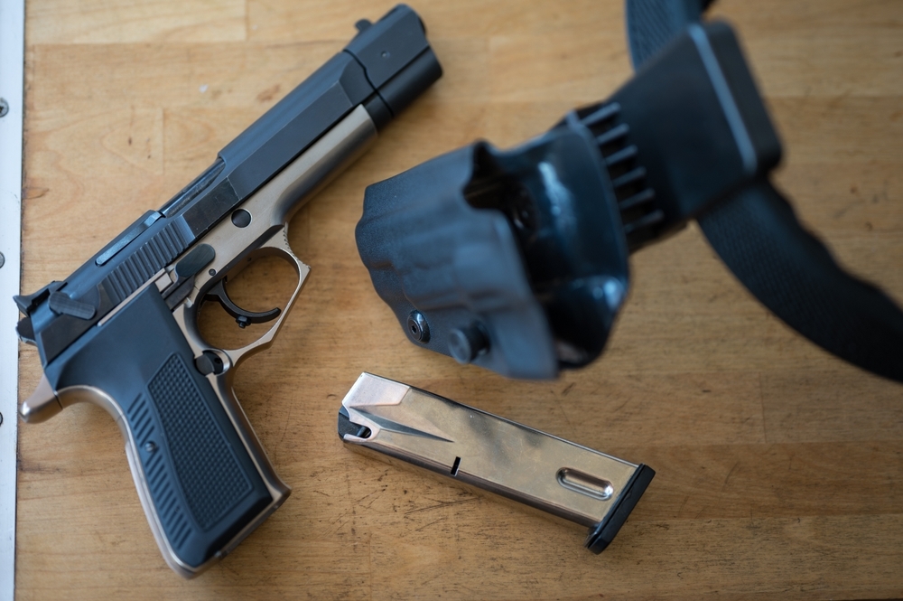 Hoster Belt and handgun on table