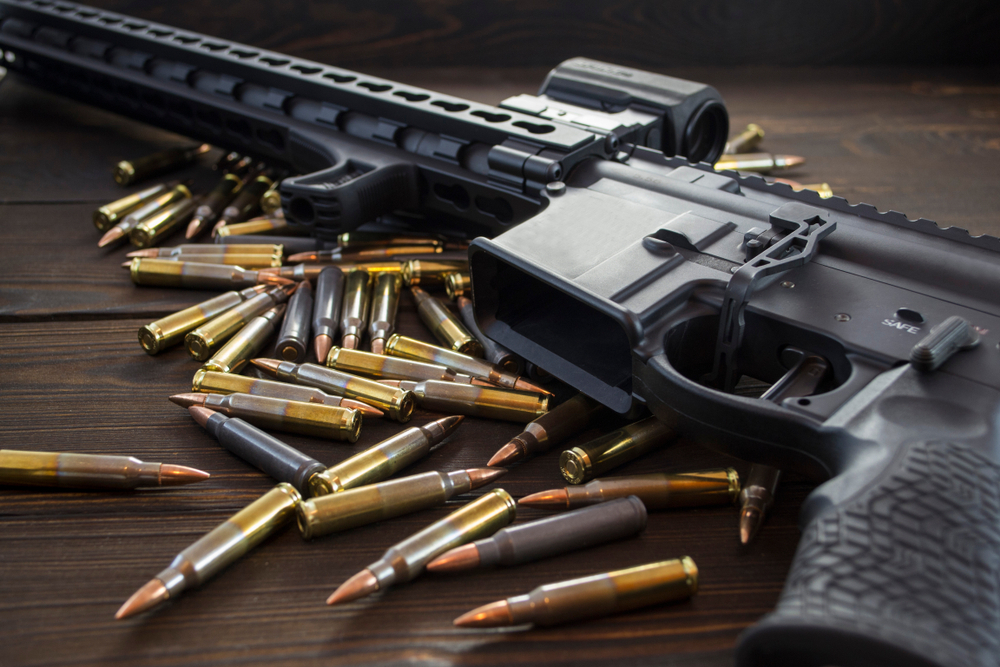 556 ammo on table and AR