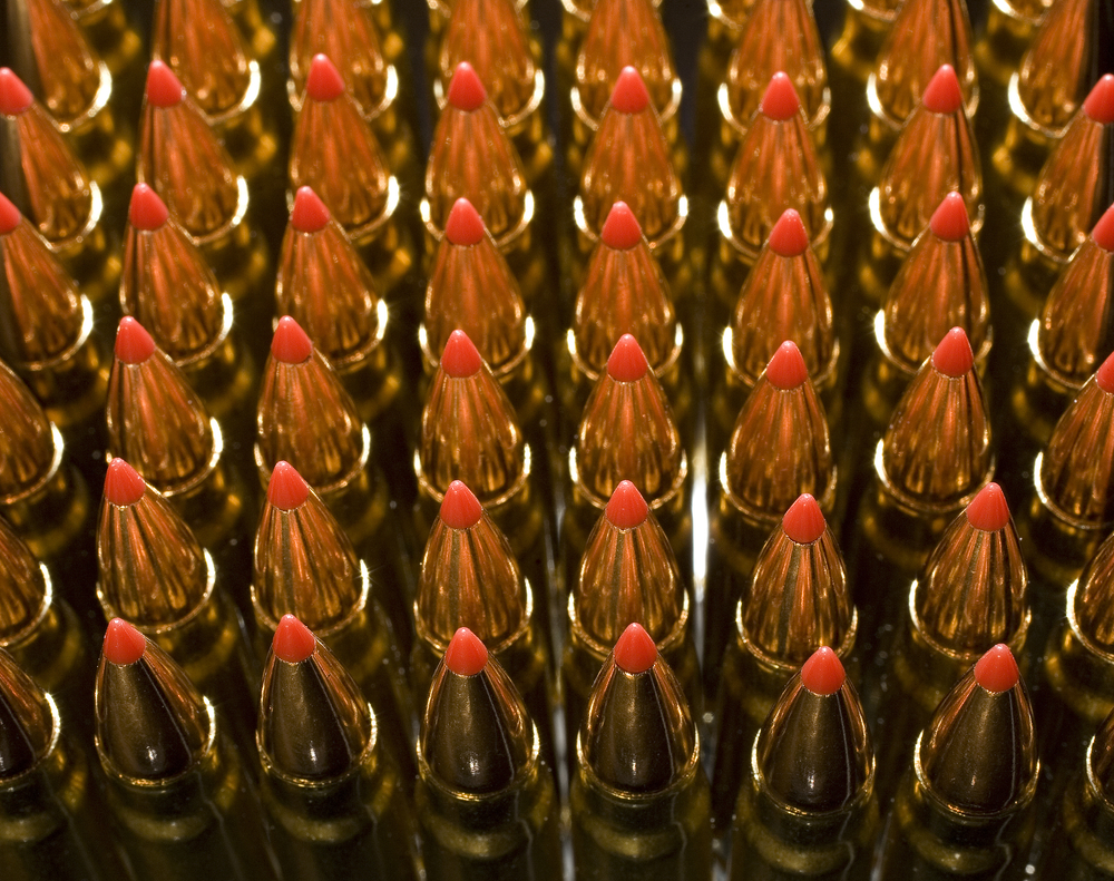 shells with copper plated bullets and red polymer tips