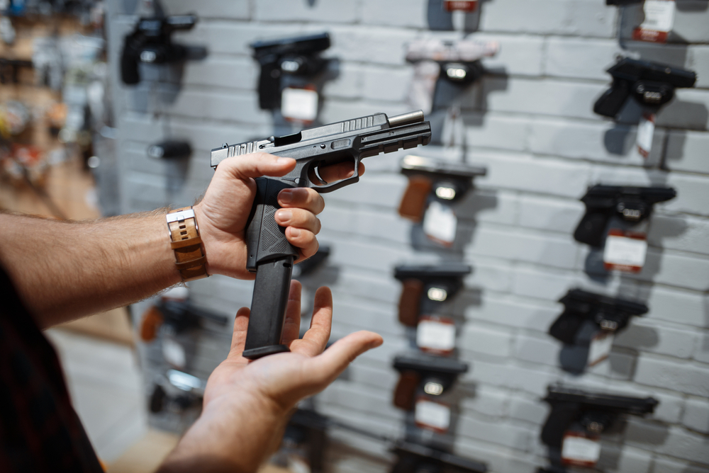 Customer Choosing Handgun